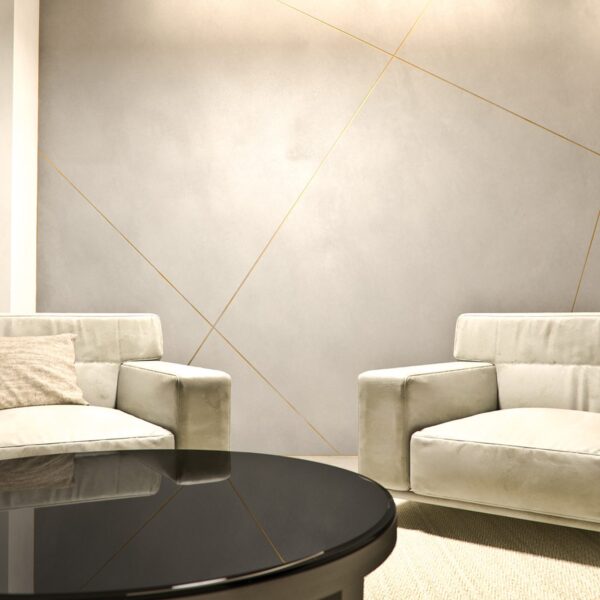 Lounge interior with a Concrete Effect Smooth feature wall
