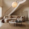 Double-height lounge finished in Travertine Monocolor